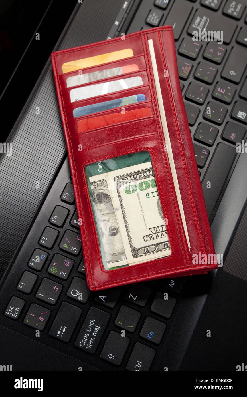 Red Wallet, Credit Card and keyboard Stock Photo - Alamy