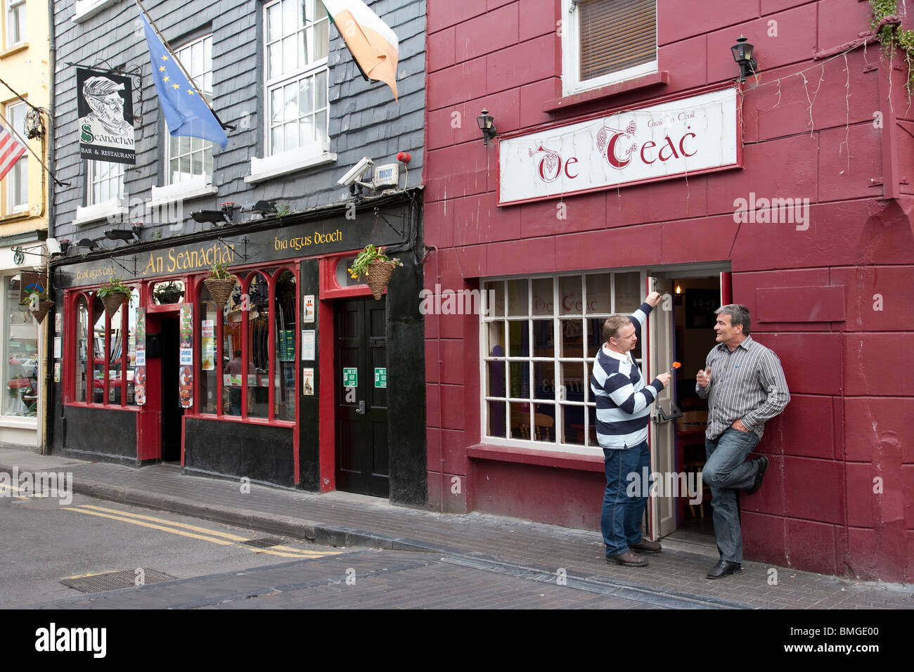 Men outside Pub, Kinsale, County Cork, Ireland Stock Photo