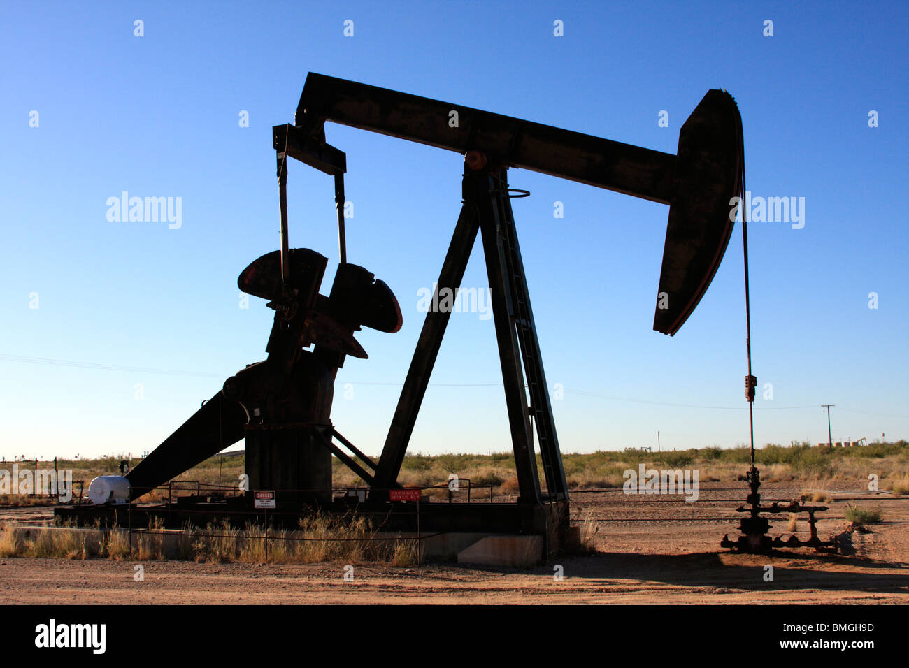 Oil well pump jack near Odessa, Texas - Stock Image