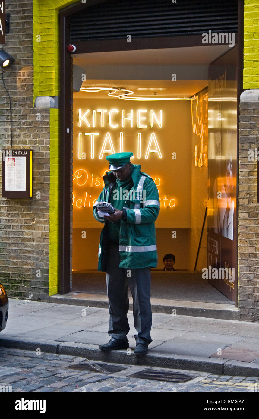 Traffic warden, Covent Garden, London, UK Stock Photo