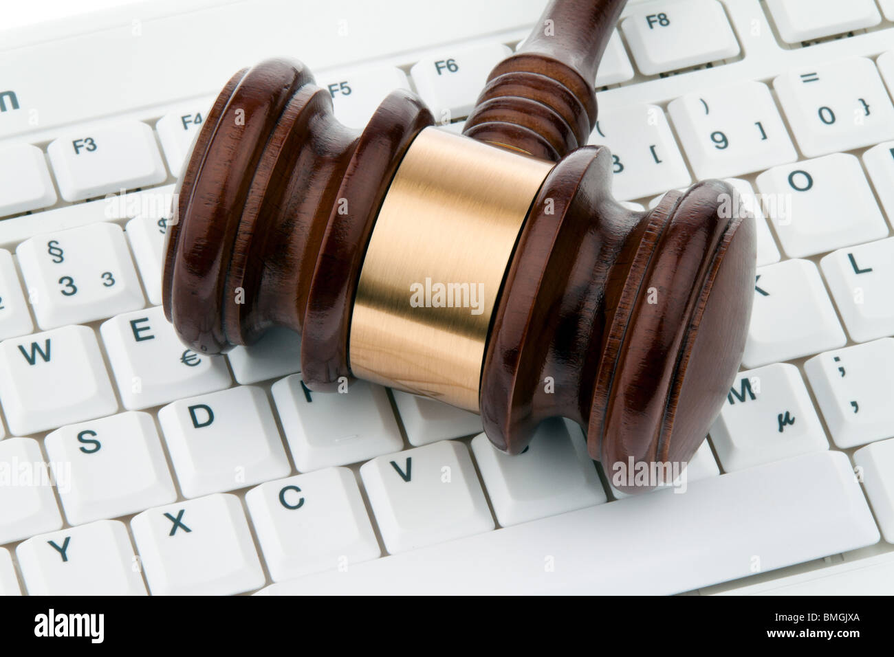 Judge hammer and keyboard. Legal certainty on the Internet. Internet auctions Stock Photo