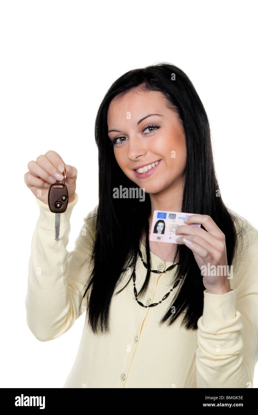 Woman with car keys and driver's license. Driving test Stock Photo