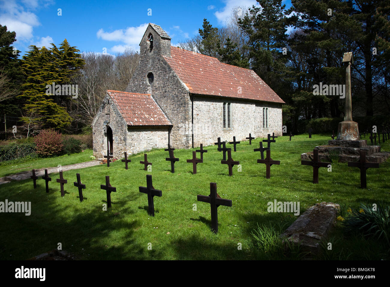 Black crosses on monks' graves St David's Church Caldey Island Wales UK Stock Photo