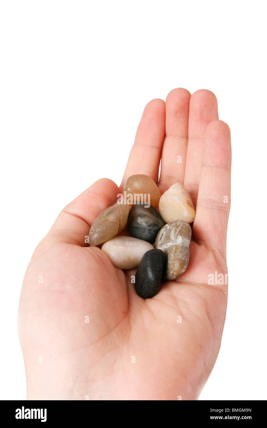Man holding some pieces of rocks. Isolate on white Stock Photo - Alamy