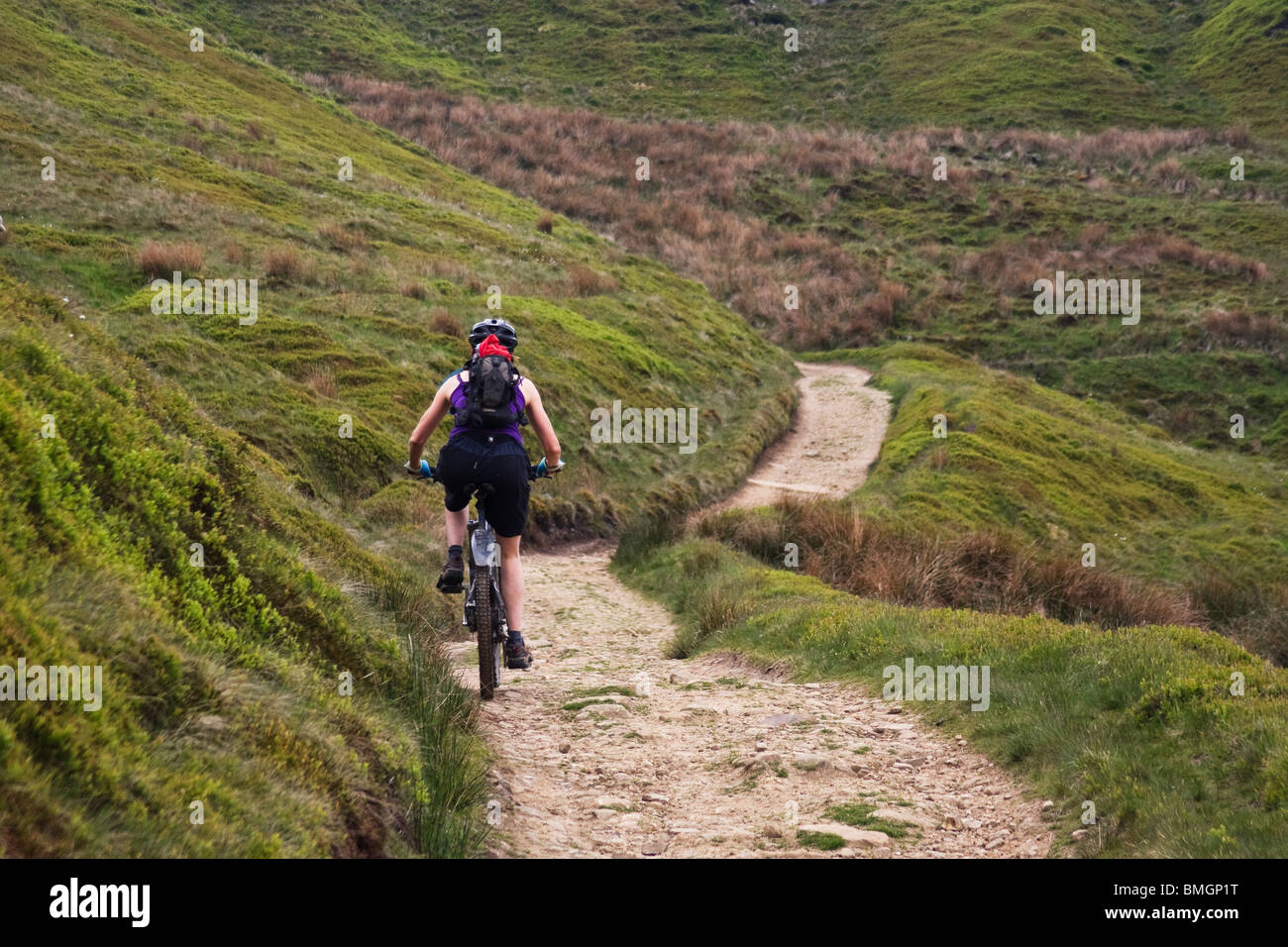 A mountain biker on the Pennine Bridleway near Widdop, Calderdale, West Yorkshire Stock Photo