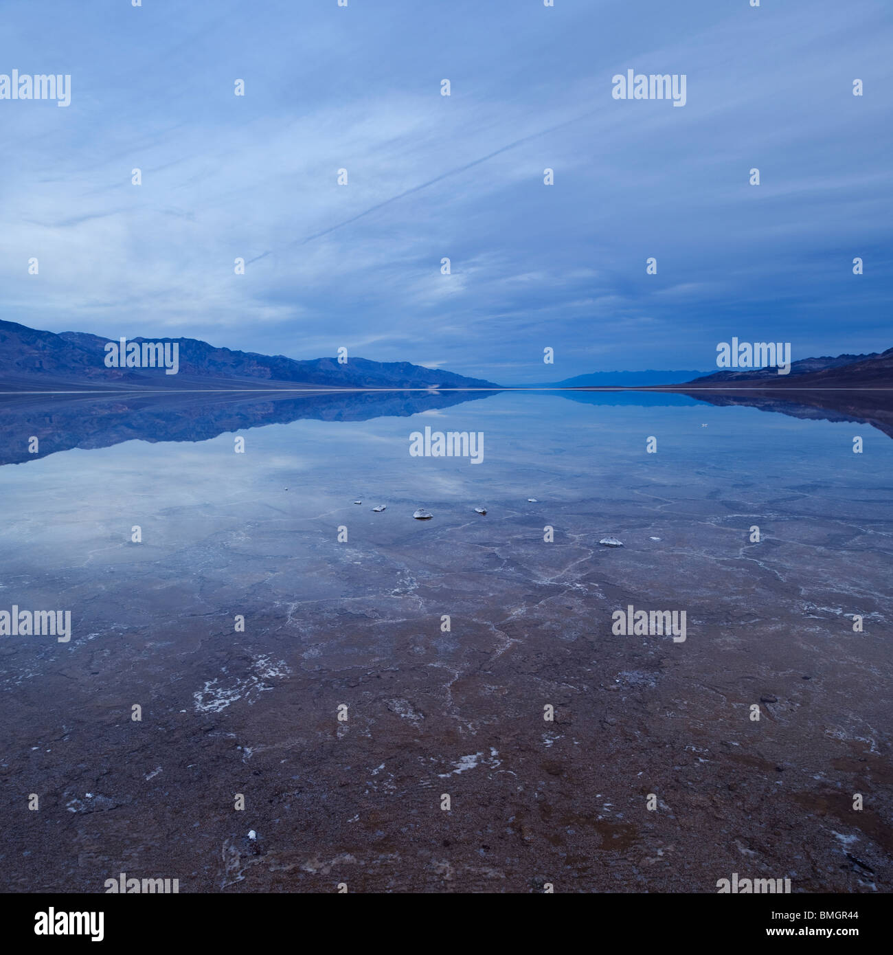 Cloudy winter weather over temporary lake in Badwater Basin, Death Valley national park Stock Photo