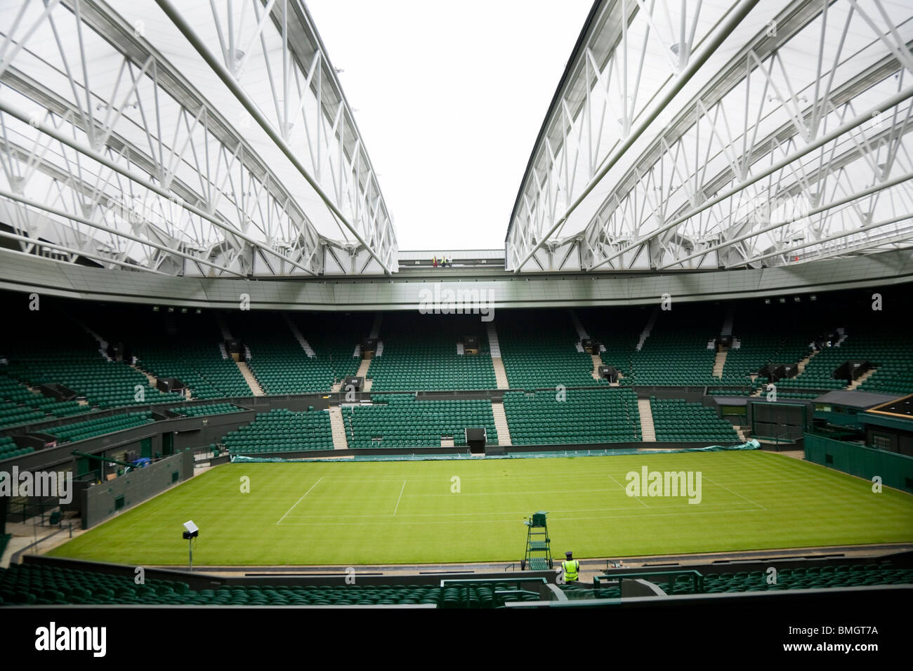 Centre Court Wimbledon / tennis Championship stadium arena with the roof closing. Wimbledon, UK. Stock Photo