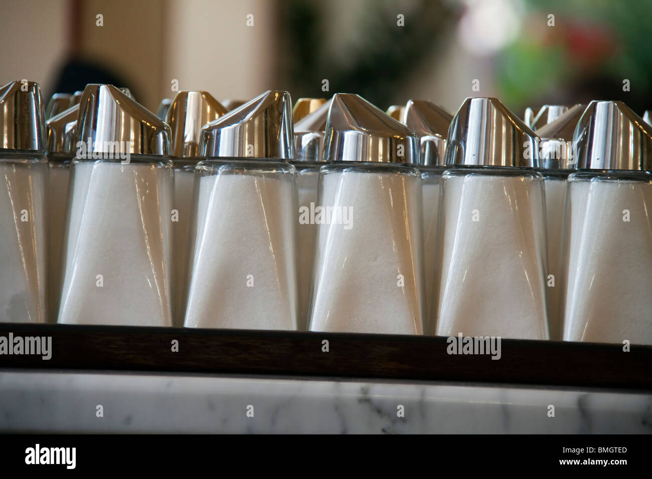 Many sugar shaker in a coffee house Stock Photo Alamy