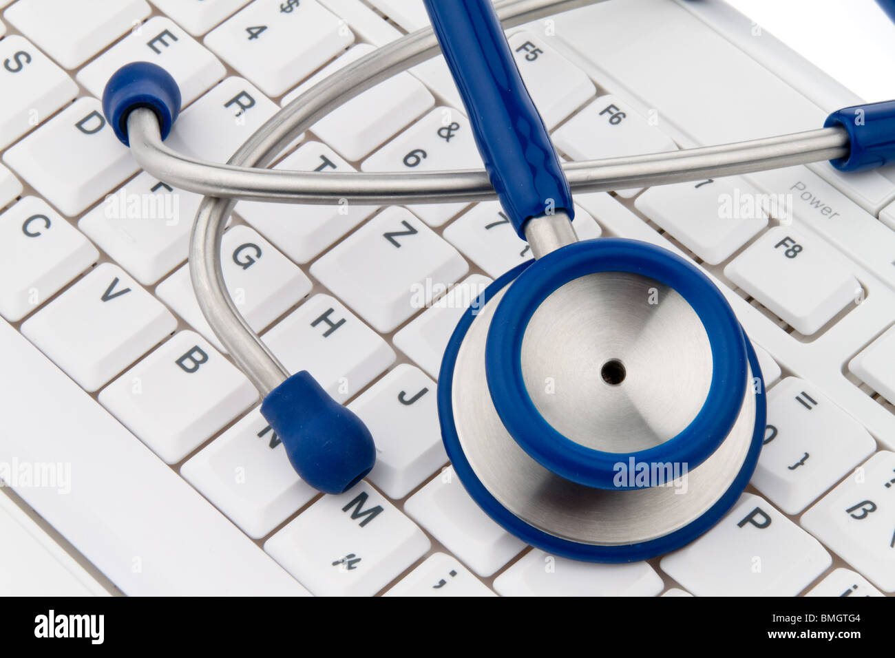A computer keyboard and stethoscope. IT for physicians. Stock Photo