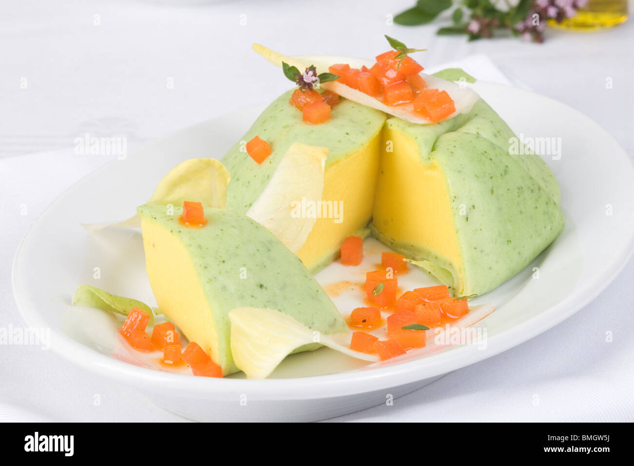 Red pepper mousse garnished Stock Photo Alamy