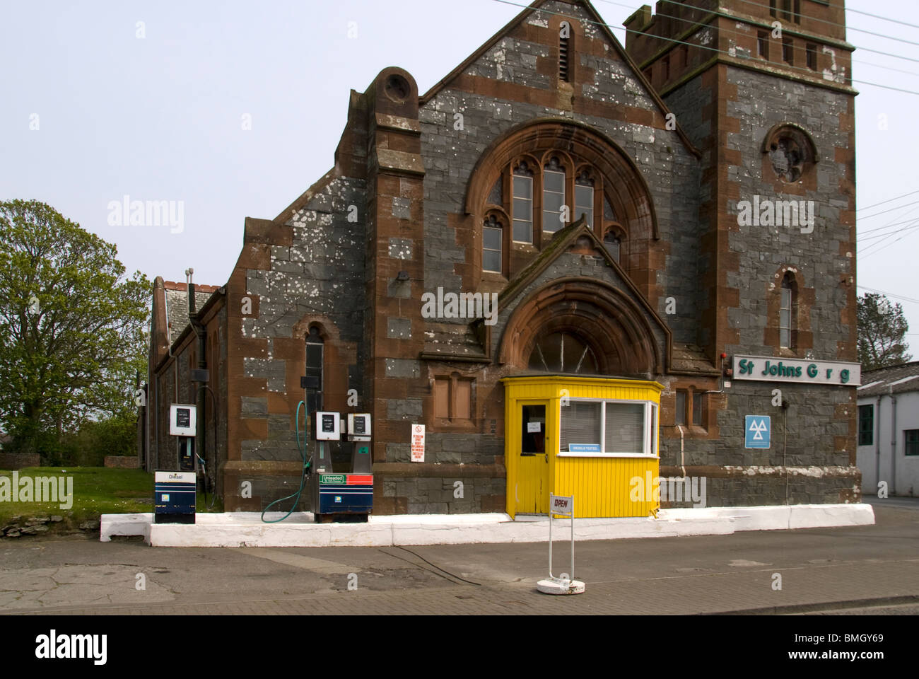Old church being used as a filling station, near Whithorn, Dumfries and Galloway, Scotland, UK Stock Photo