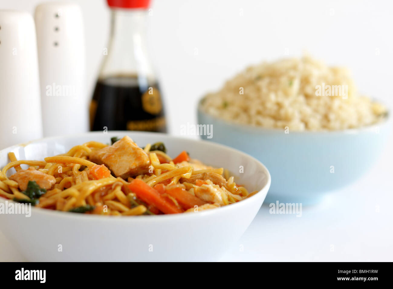 Chicken Chow Mein with Egg Fried Rice Stock Photo