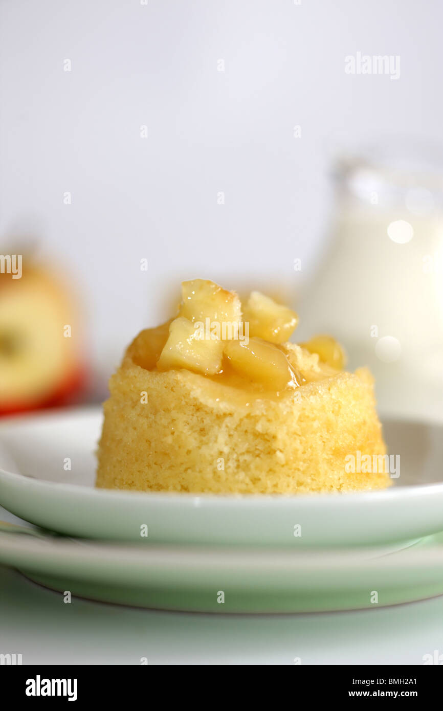 Traditional Authentic British Dessert Eve's Pudding With Stewed Apples