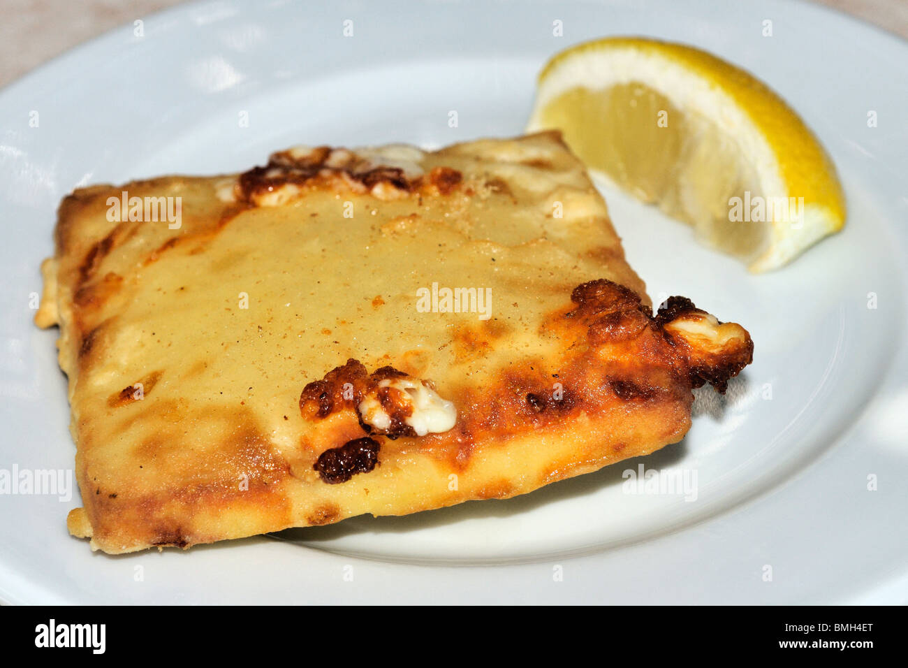 Saganaki (Pan-Seared Greek Cheese) Stock Photo