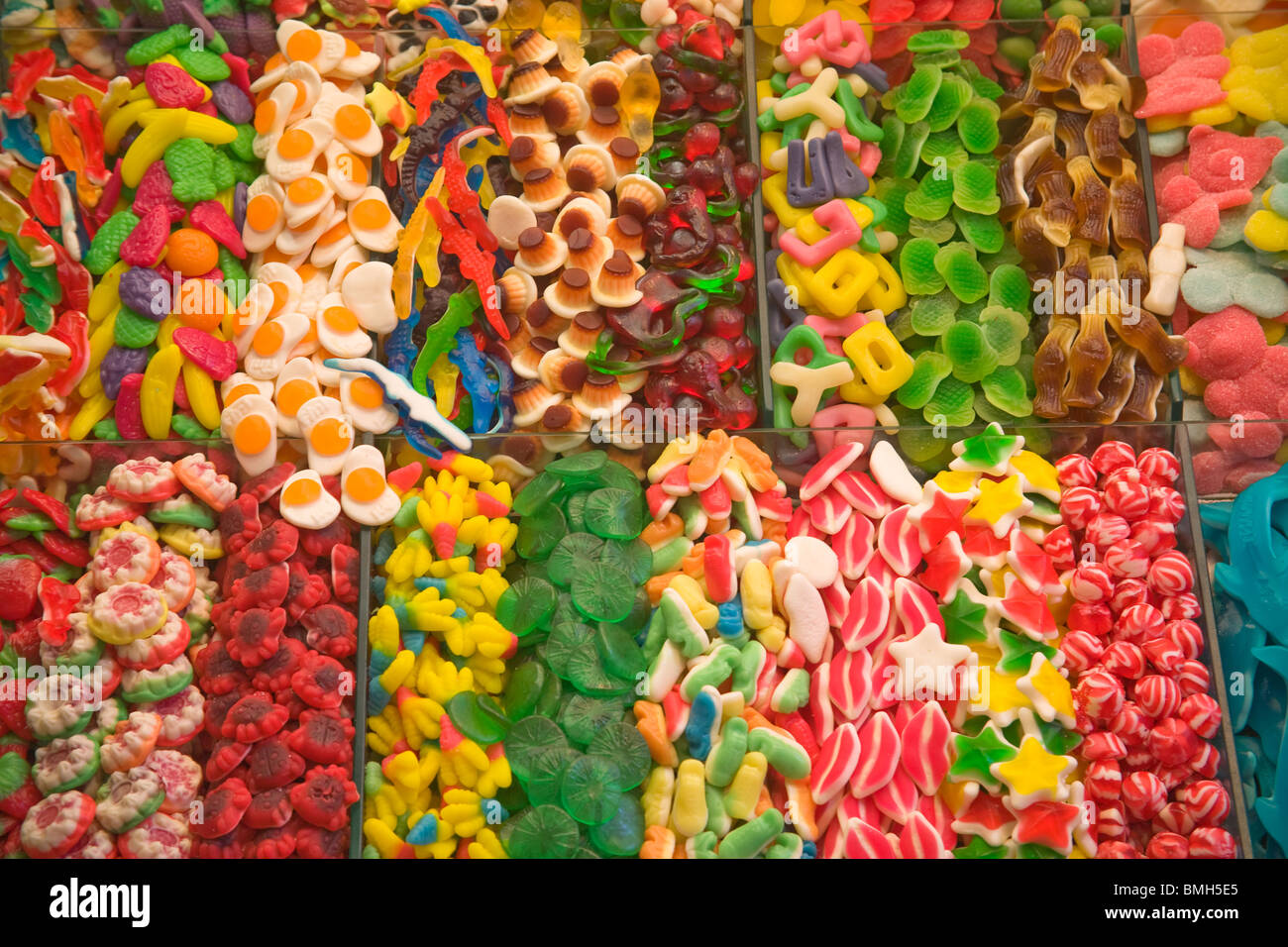 Assortment of sweets and candies on different shapes and colours on a