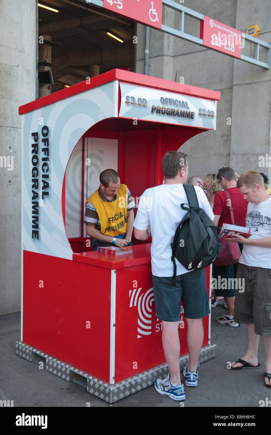 Programme stall at Twickenham Rugby Stadium, home of English International rugby, in SW London, UK.. Stock Photo