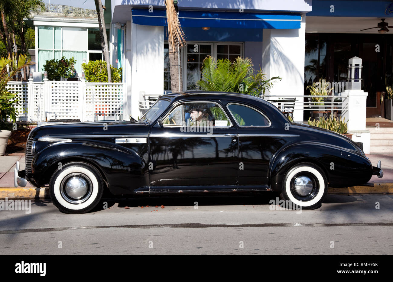Buick Eight parked in front of Park Central Hotel 640 Ocean Drive, Miami Beach, Florida, USA Stock Photo