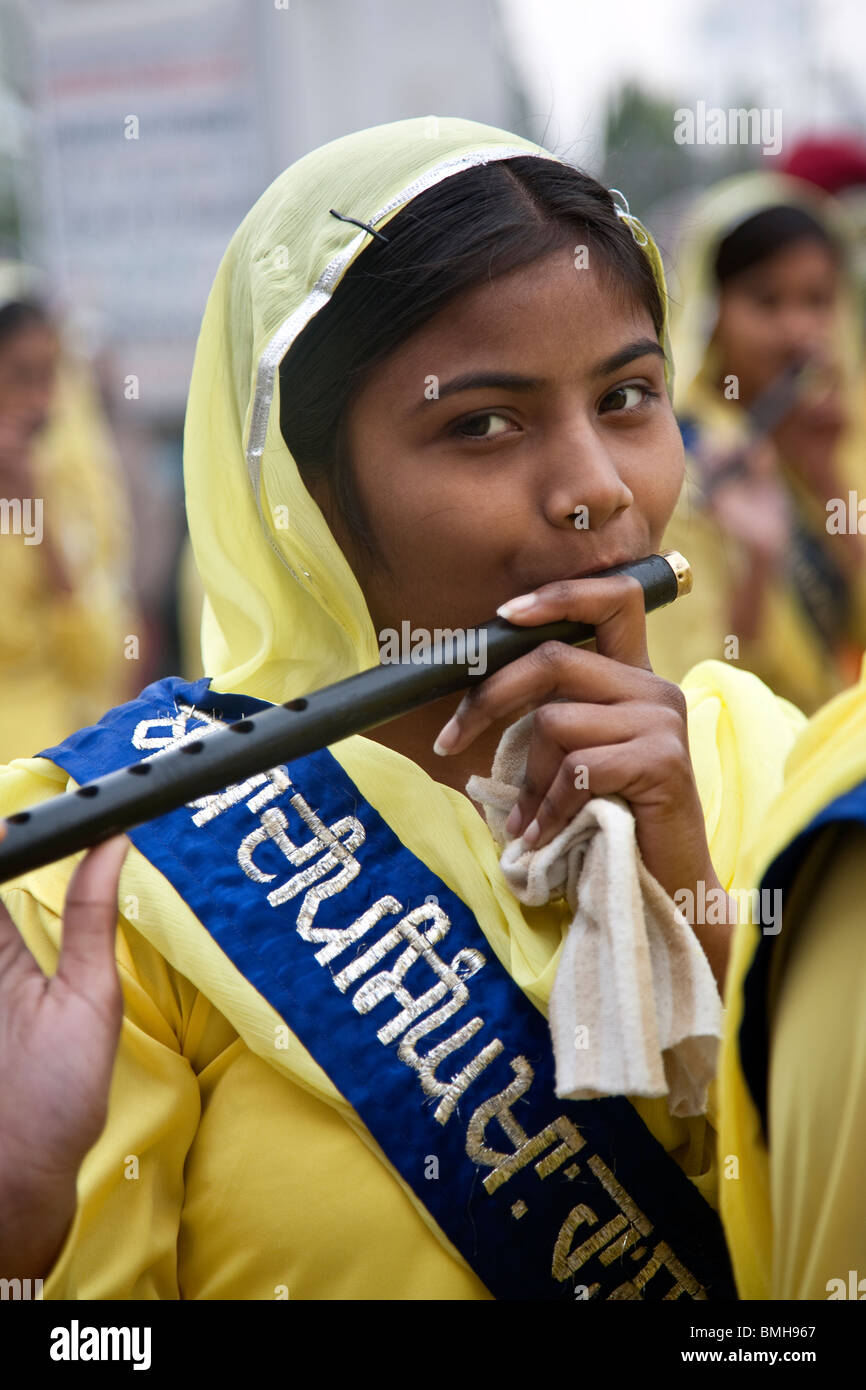 India girl playing flute. Amritsar. Punjab. India Stock Photo Alamy
