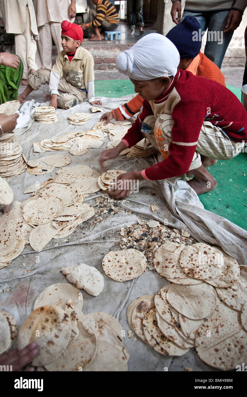 Chapatis (traditional indian bread) for the pilgrims. The Golden temple. Amritsar. India Stock Photo
