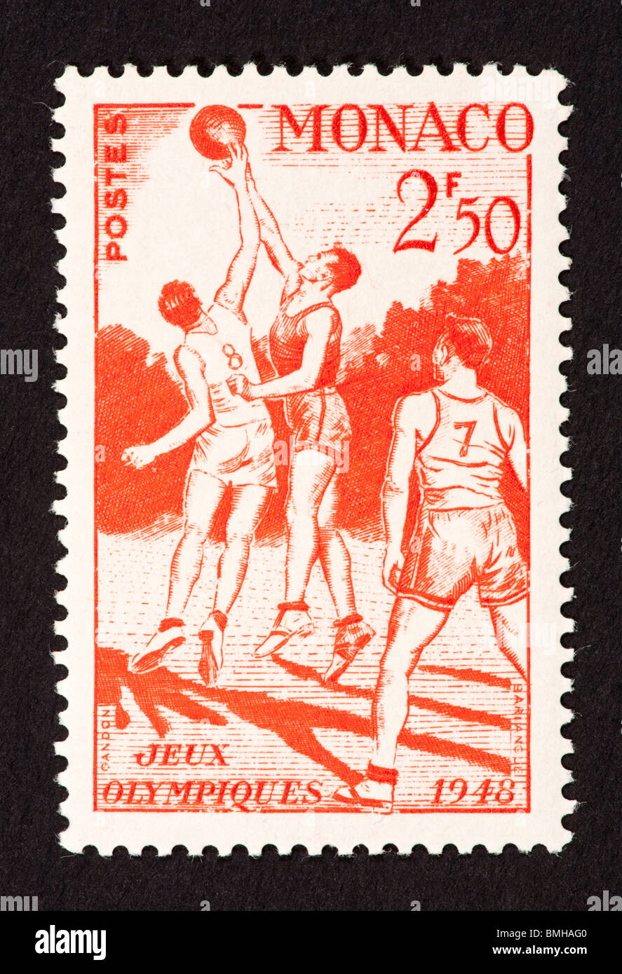 Postage stamp from Monaco depicting basketball players, for the 1948 Olympic games. Stock Photo