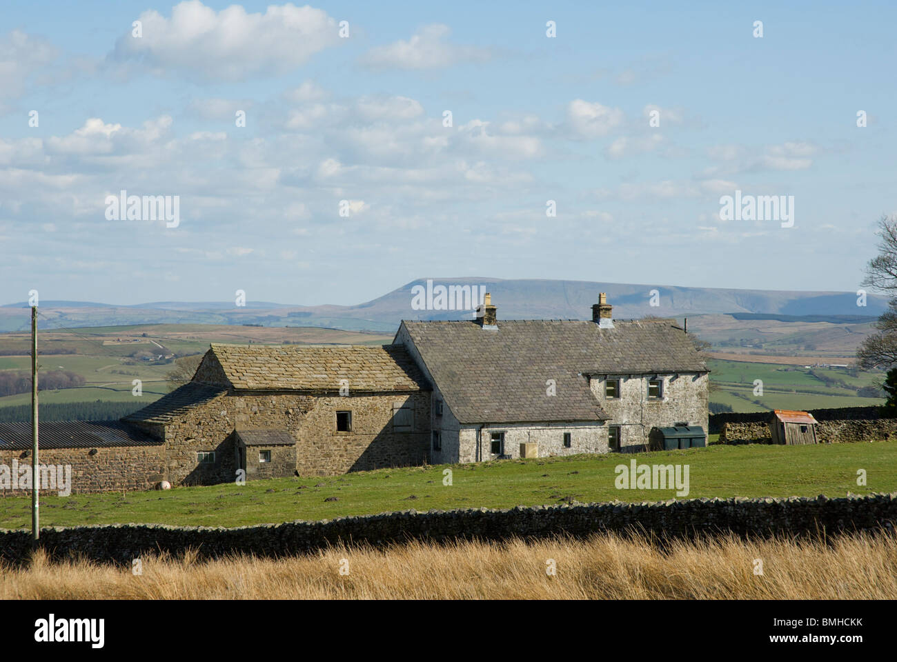 Farmhouse and Pendle Hill, Lancashire, England UK Stock Photo