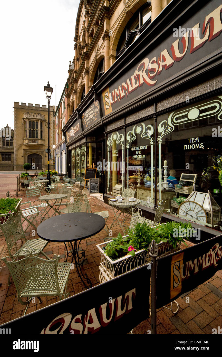 A local stylish café and emporium in Rugby with Ruby School in background, Warwickshire, UK Stock Photo