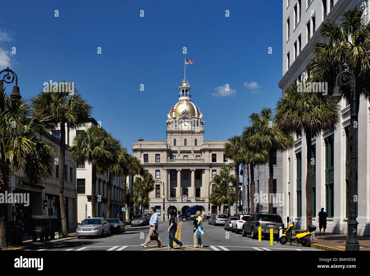 Pedestrains Crossing Bull Street in Front of the Savannah City Hall in