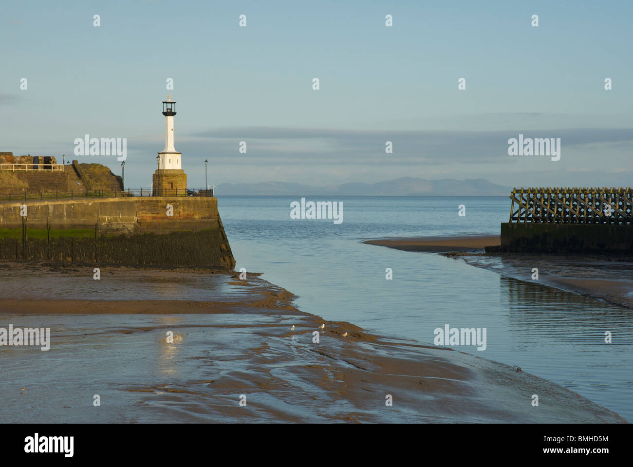 The lighthouse and harbour, Maryport, Cumbria, England UK Stock Photo