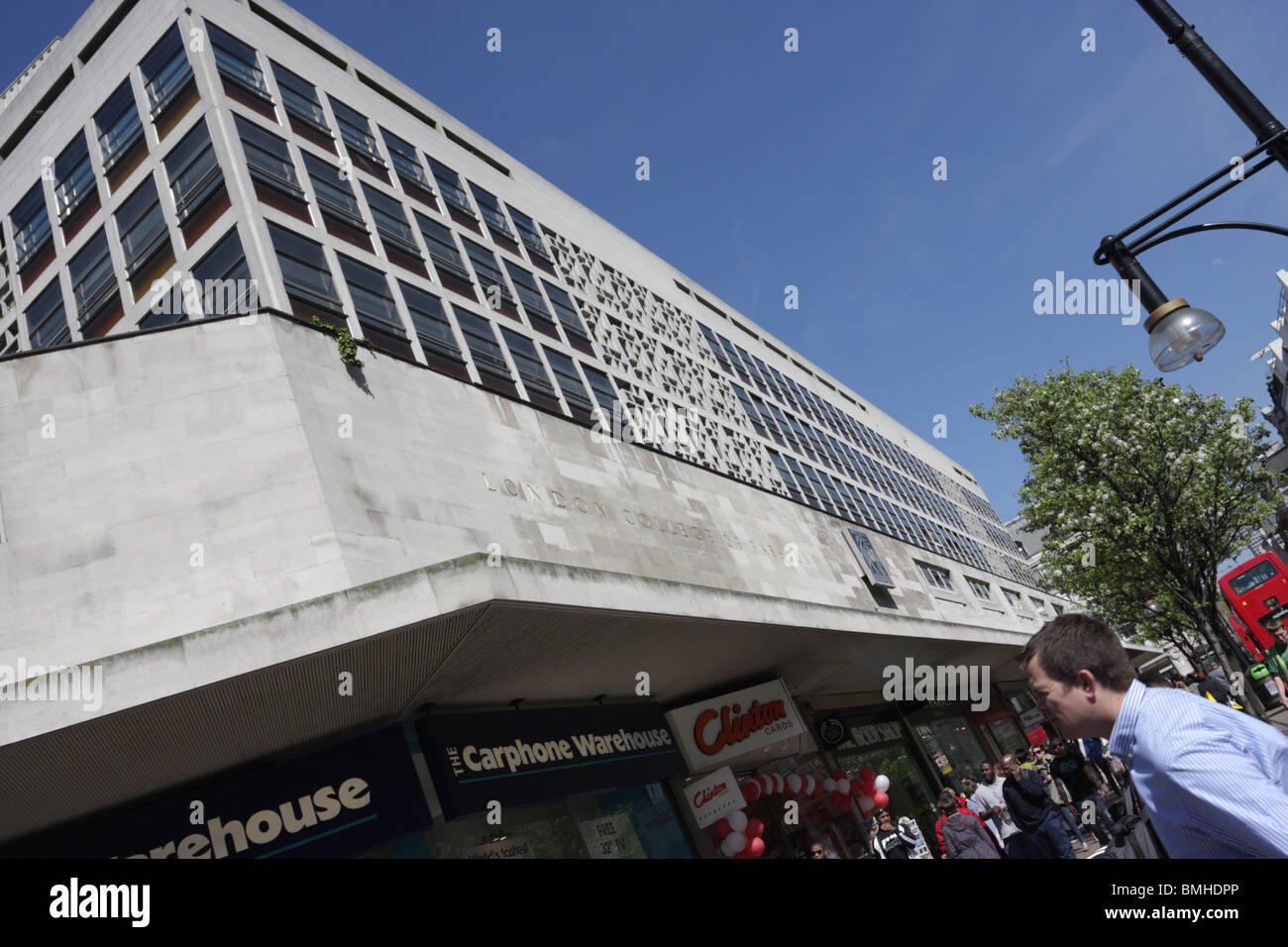 Set above the bustling Oxford Street stores is this sixties building housing the renown London College of Fashion. Stock Photo