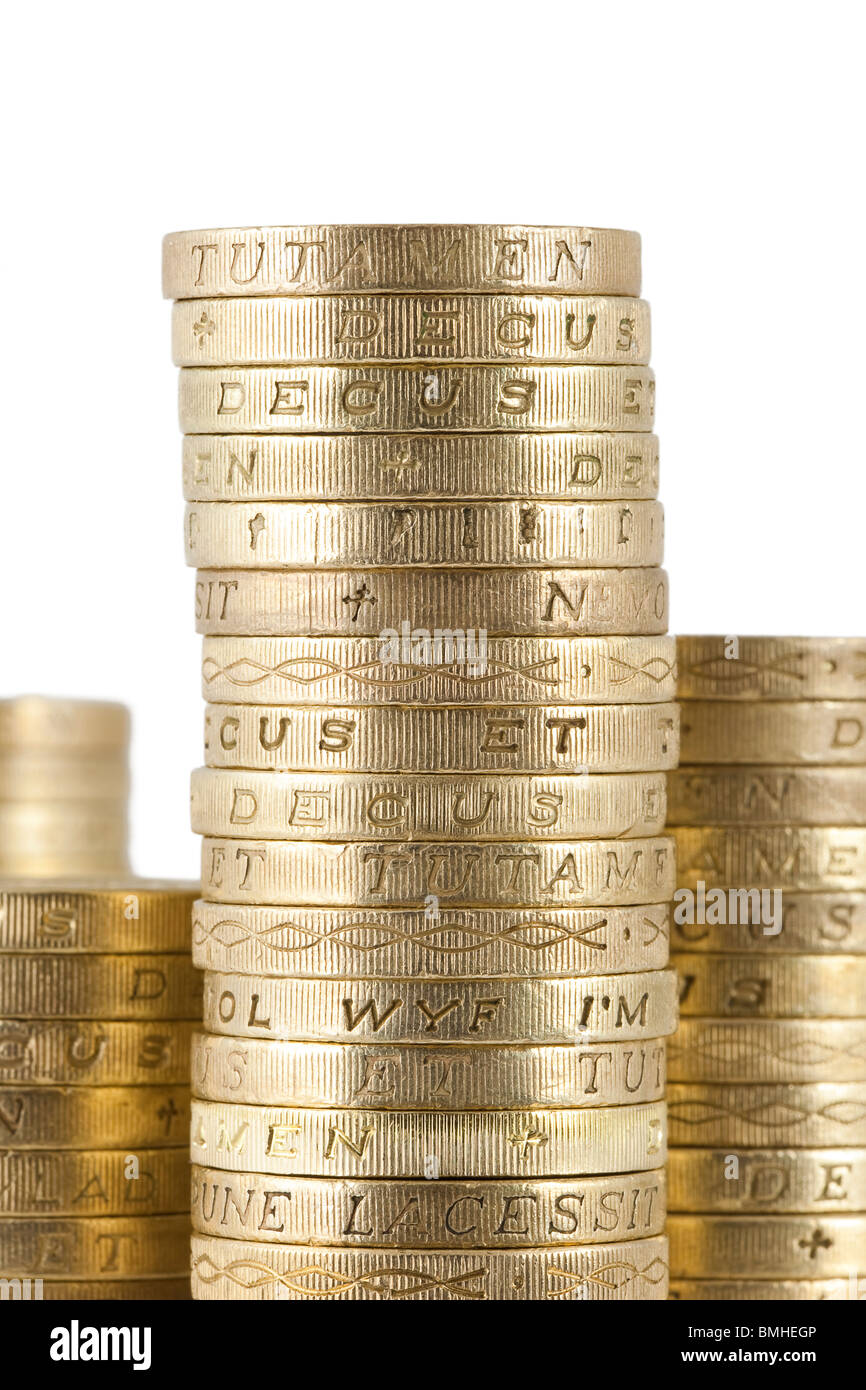 british currency sterling pound coins piled Stock Photo