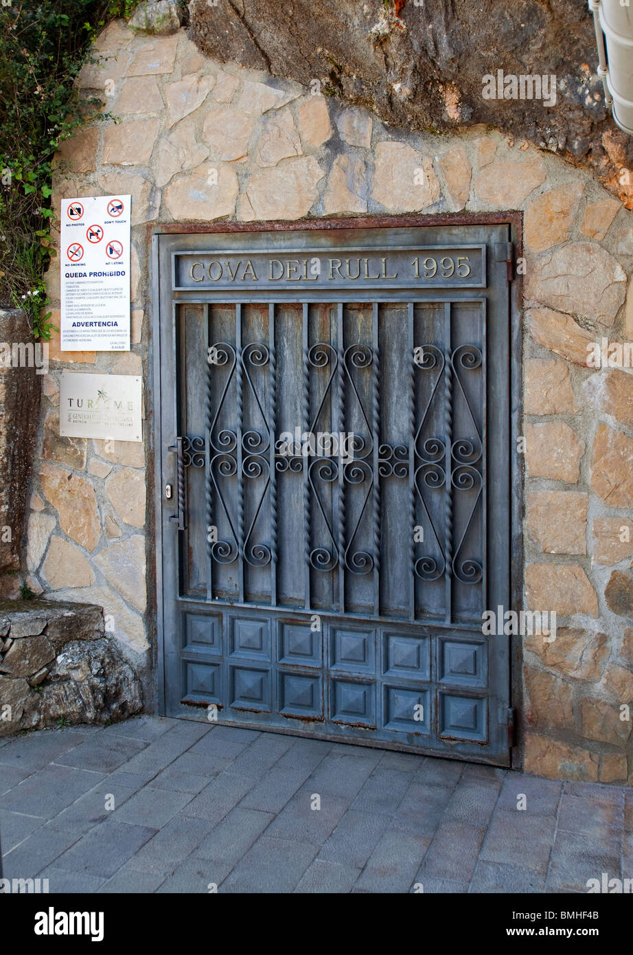 La cova del Rull, entrance of cave, Iron gate. Marina alta 106235 Spain10 Stock Photo