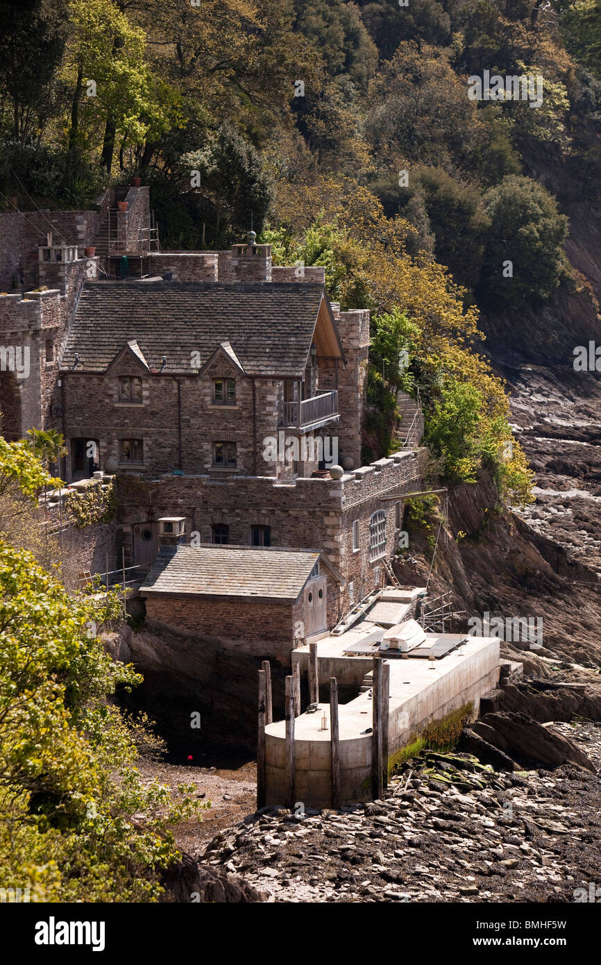 UK, England, Devon, Kingswear, expensive stone built riverside property at edge of River Dart