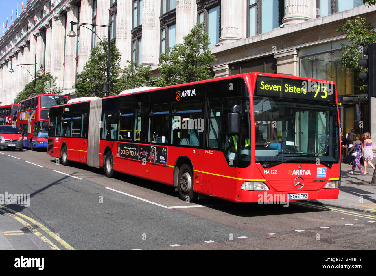 A red bendy-bus on Oxford Street, London, Engalnd, U.K. Stock Photo