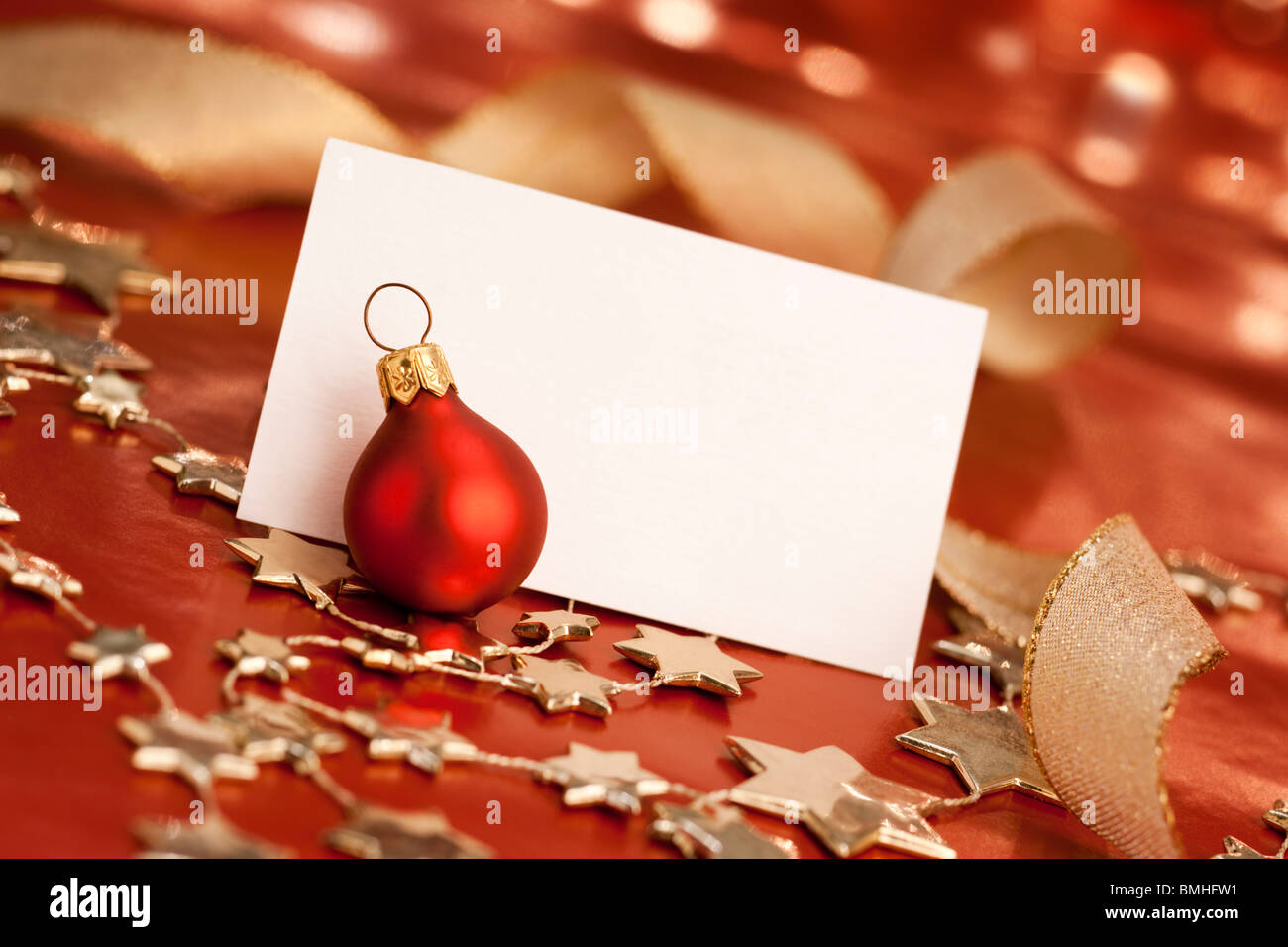 Christmas card with bauble. Selective focus, aRGB. Stock Photo