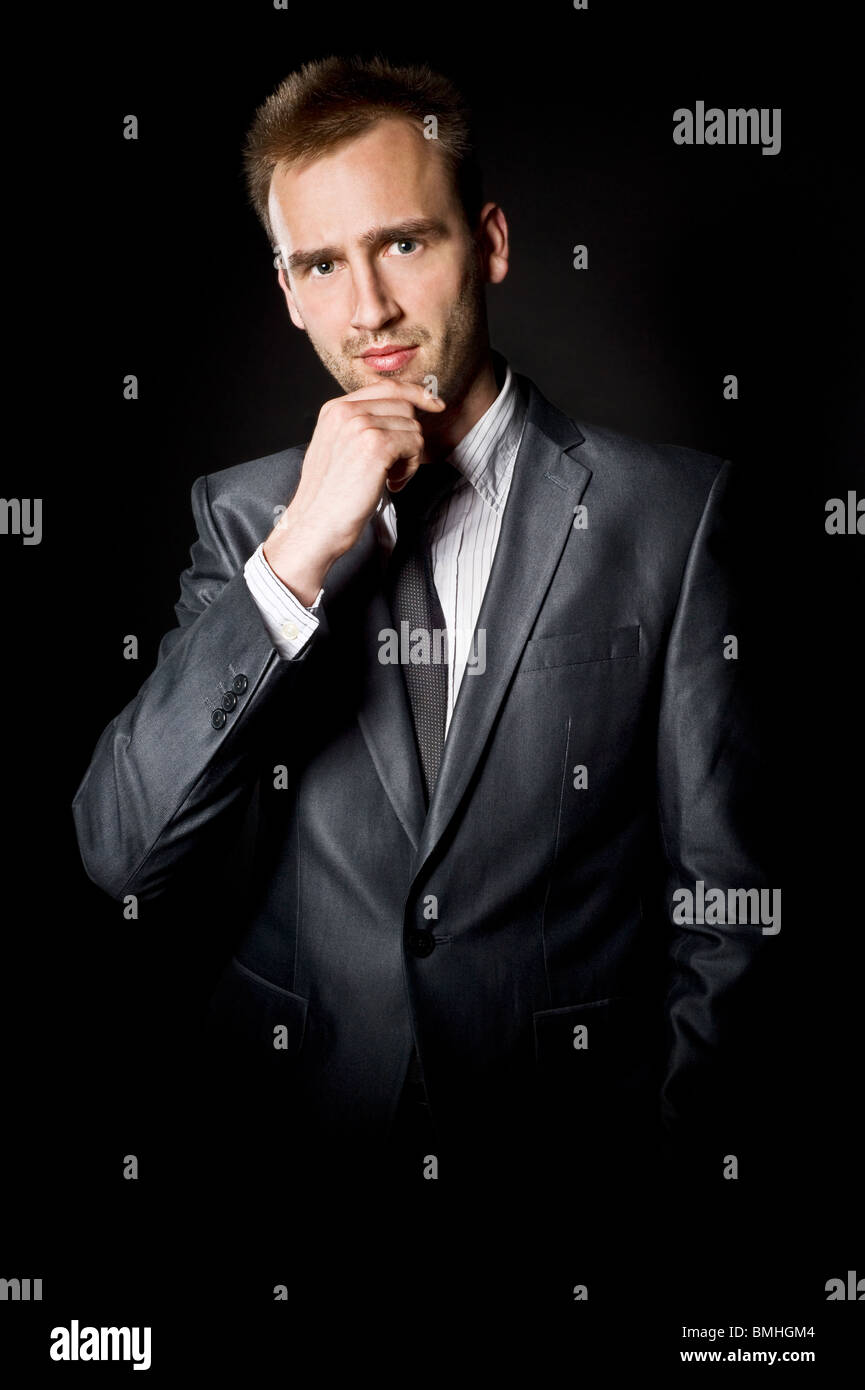 young handsome male wearing suit Stock Photo