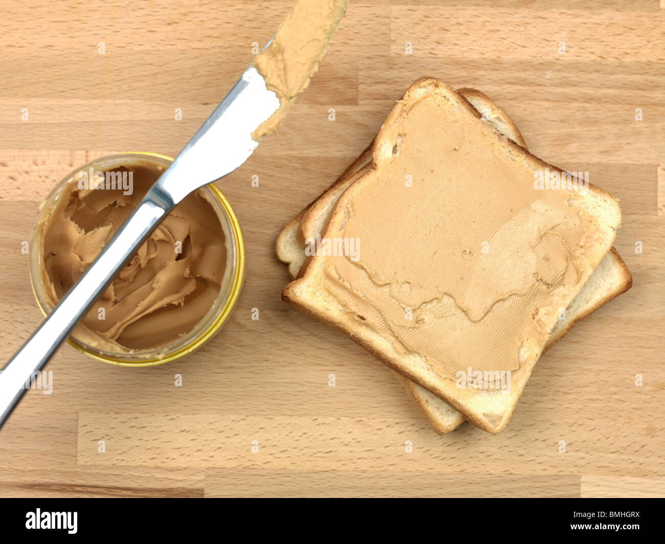Peanut butter spread on white bread Stock Photo Alamy