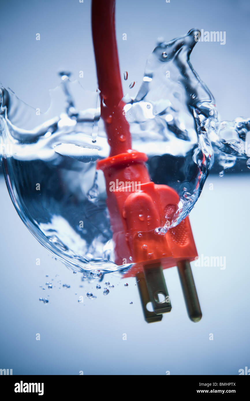 Electrical plug in water Stock Photo Alamy