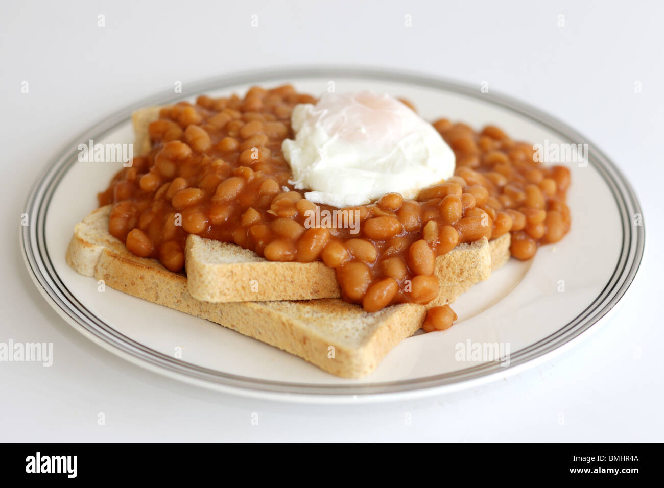 Poached Egg and Baked Beans on Toast Stock Photo Alamy