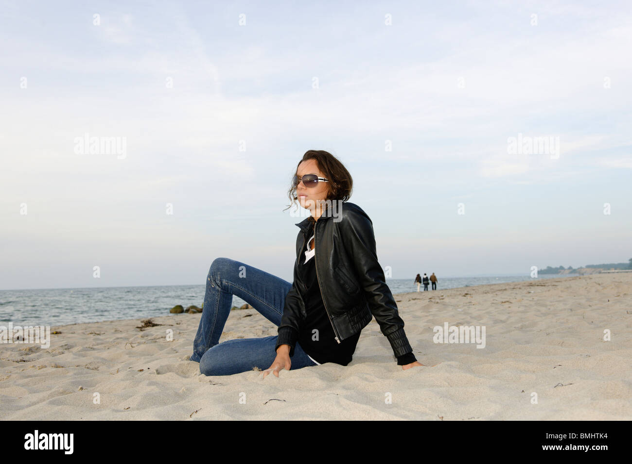 Young woman, 20+, on a beach, casual, fun, athletic, Niendorf on the Baltic Sea, Schleswig-Holstein, Germany, Europe Stock Photo