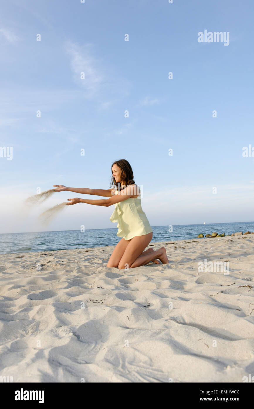 Young woman, 20+, on a beach, fun, lifestyle, pleasure, ease, Niendorf on the Baltic Sea, Schleswig-Holstein, Germany, Europe Stock Photo