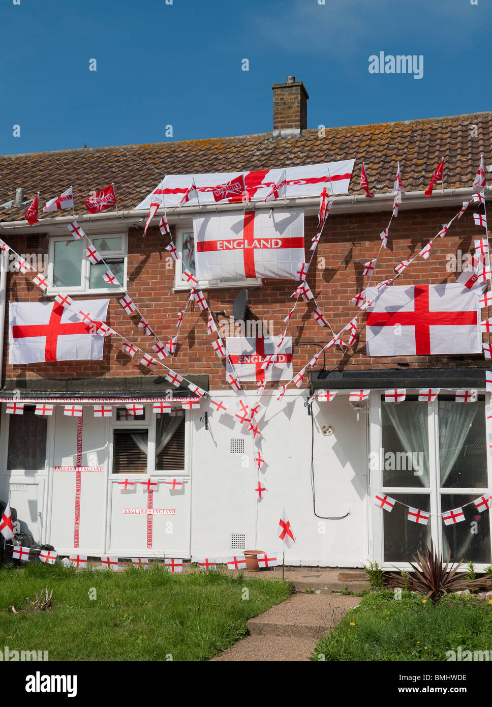 House Decorated in England Flags for the 2010 World Cup, Basildon, Essex, Britain - 9th June 2010 Stock Photo