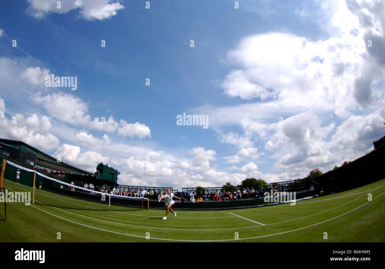 wide angle shot of wimbledon  ladies tennis on the outside courts Stock Photo