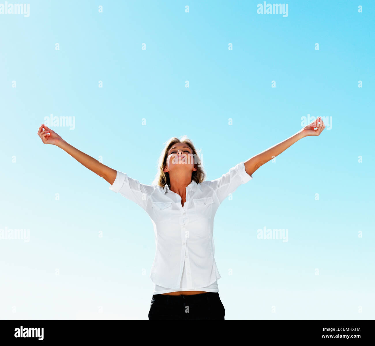 Relaxed woman arms open hi-res stock photography and images - Alamy