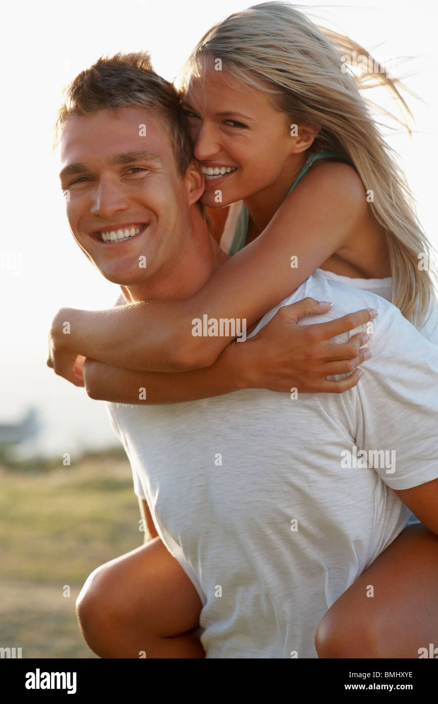 Midadult Caucasian Woman Giving Man Piggyback Stock Photo 3194063