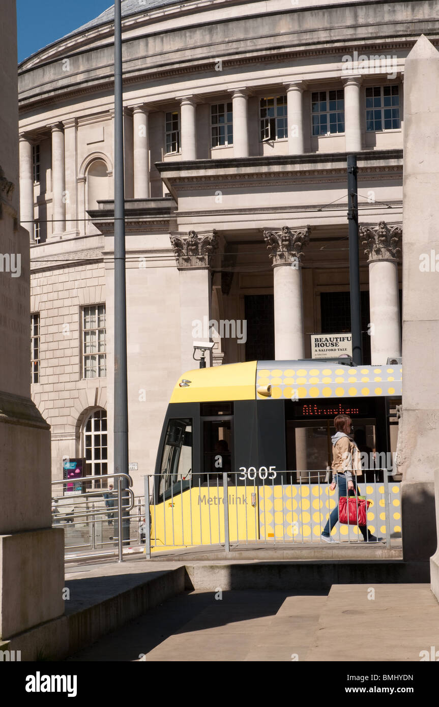 Metrolink tram St Peter's Square,Manchester.Central library in the background. Stock Photo