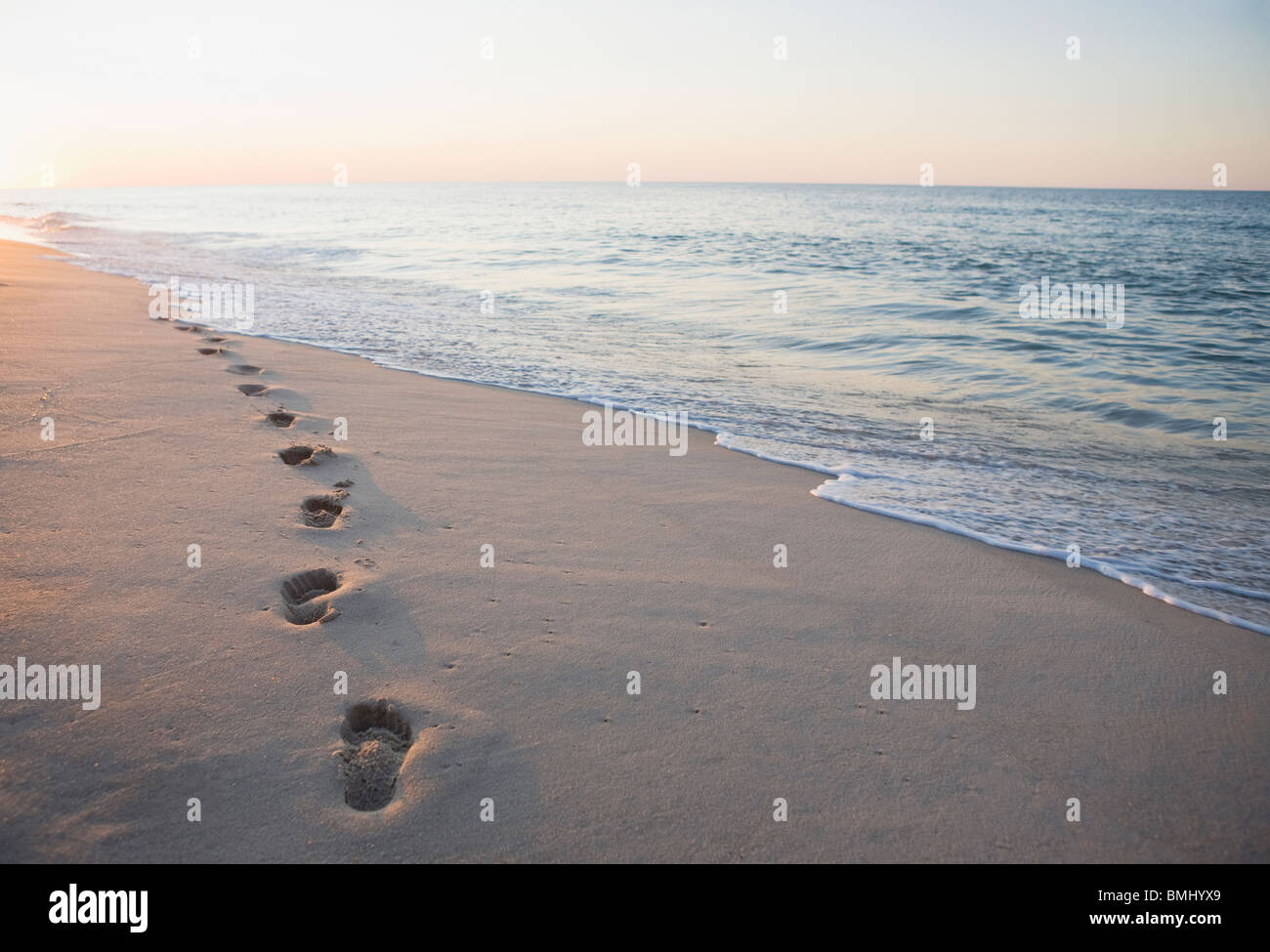Footprints in the sand Stock Photo