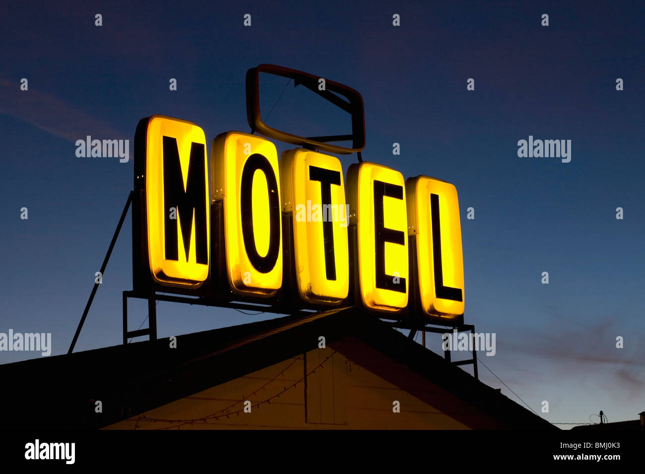 Illuminated motel sign Stock Photo