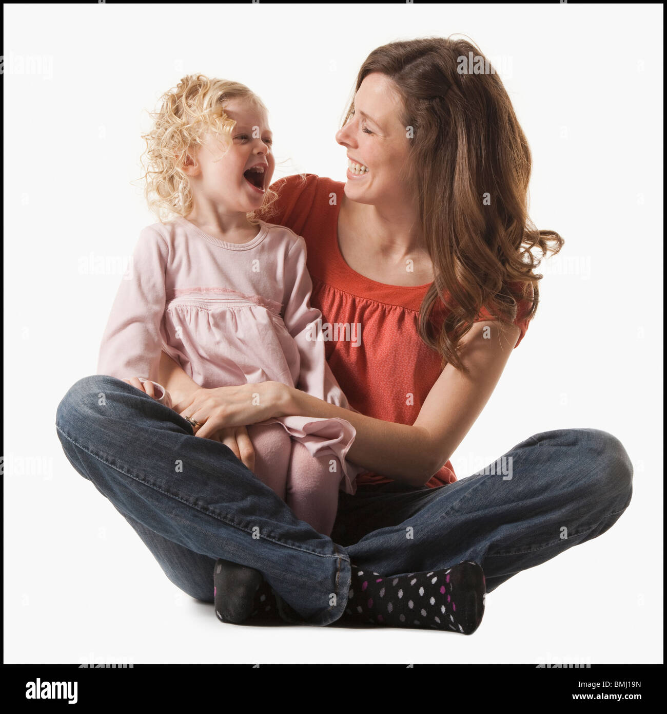 Baby in moms lap hi-res stock photography and images - Alamy