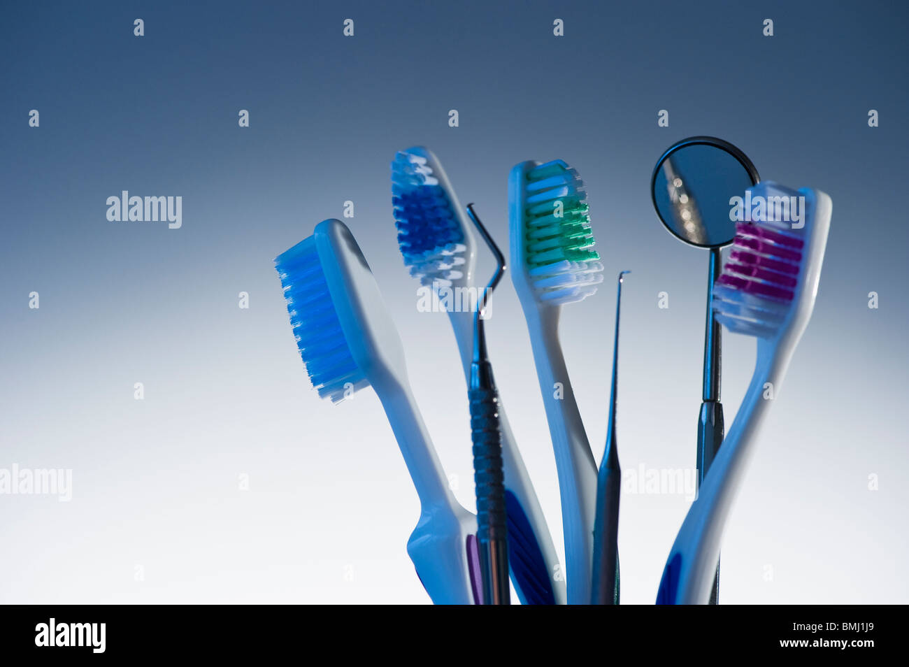 Toothbrushes and dental instruments Stock Photo