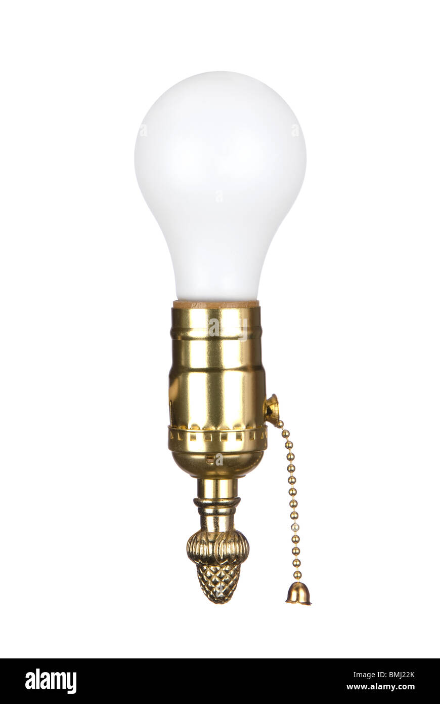 A light bulb in an electrical brass socket with pull chain. Stock Photo